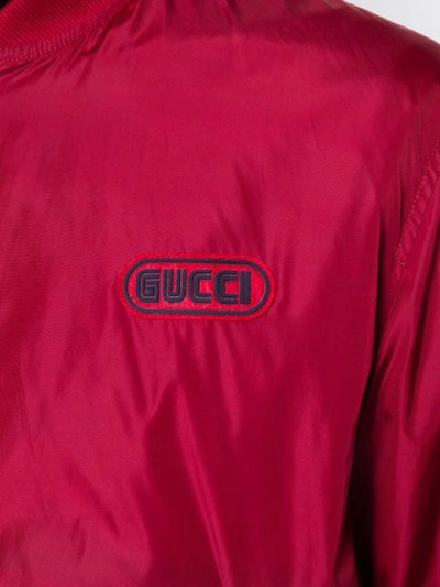 Shop Gucci Reversible Logo Bomber Jacket In Red