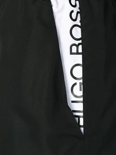 Shop Hugo Boss Contrast Logo Swim Shorts In Black