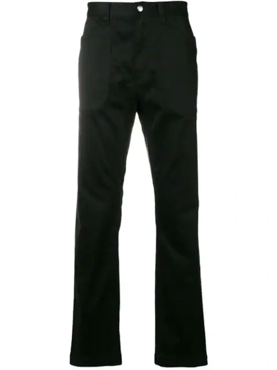 Shop White Mountaineering Slim-fit Trousers - Black