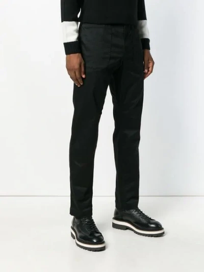 Shop White Mountaineering Slim-fit Trousers - Black