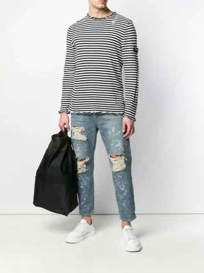 Shop Balmain Destroyed Jeans In 6aa Blu