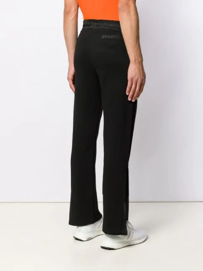Shop Plein Sport Logo Track Trousers In Black