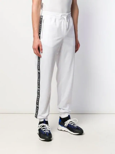 Shop Givenchy Logo Stripe Track Pants In White