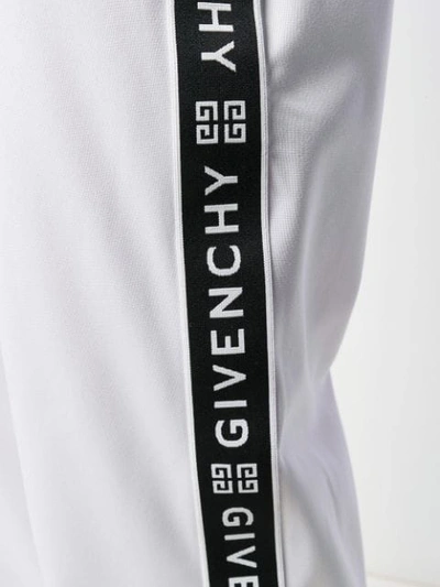 Shop Givenchy Logo Stripe Track Pants In White