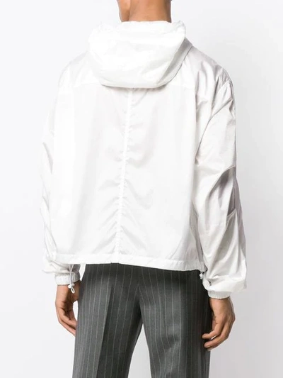 Shop Versace Hooded Lightweight Jacket In A001