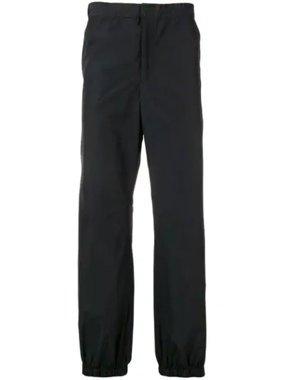 Shop Prada Elasticated Waist Trousers In Black