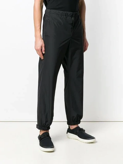 Shop Prada Elasticated Waist Trousers In Black