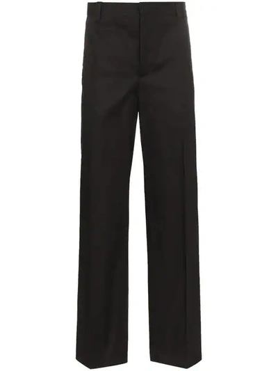 Shop Burberry Script Side Stripe Trousers In Black