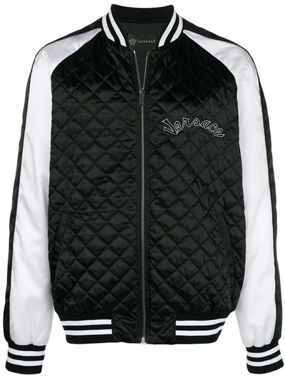 Shop Versace Satin Bomber Jacket In Black