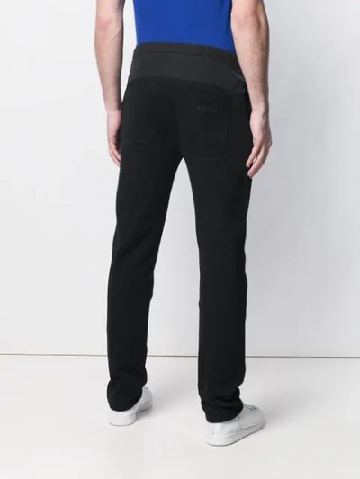 Shop Kenzo Track Style Trousers In Black