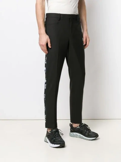 Shop Neil Barrett Tailored Trousers With Side Camo Stripe In Black