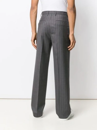 Shop Versace Pinstripe Tailored Trousers In Grey