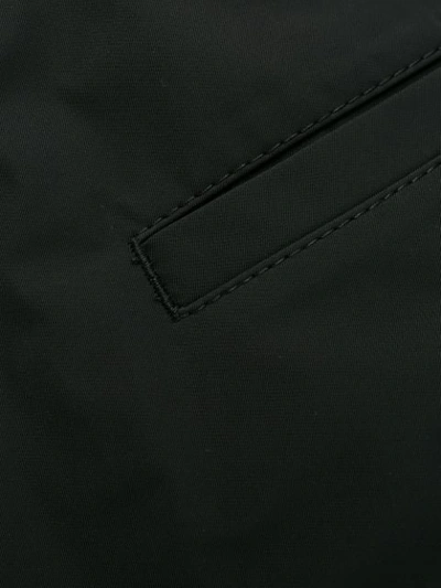 Shop Prada Ankle Strap Logo Trousers In Black