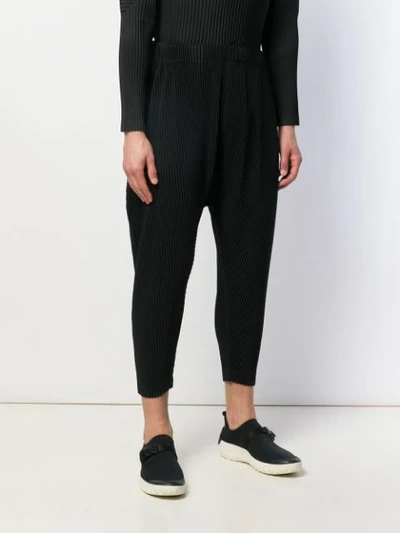 Shop Issey Miyake Dropped-crotch Pleated Trousers In Black