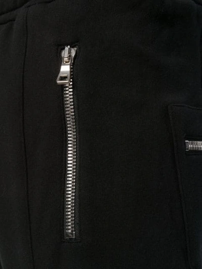 Shop Balmain Cargo Track Pants In Black