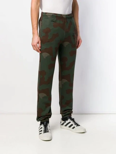 Shop Off-white Camouflage Print Track Pants In Green