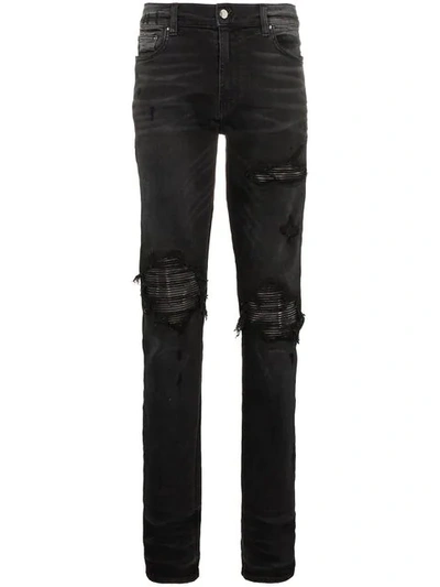 Shop Amiri Slim-fit Distressed Cotton And Leather Jeans In Black