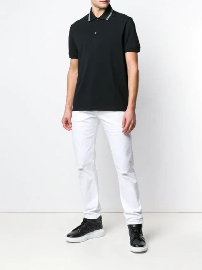 Shop Versace Logo Trim Polo Shirt In Black