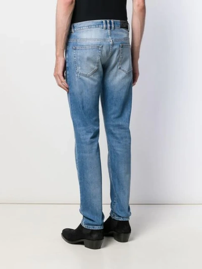 Shop Balmain Distressed Straight-leg Jeans In Blue