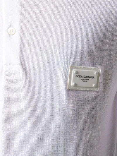 Shop Dolce & Gabbana Branded Plate Polo Shirt In W0800 White