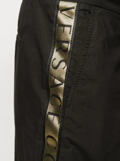 Shop Versace Logo Trim Shorts In Black