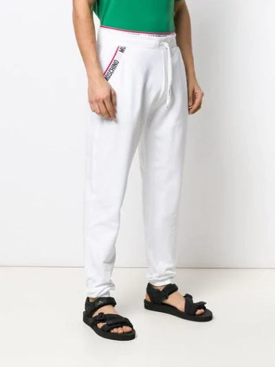 Shop Moschino Branded Track Pants In 0001 White