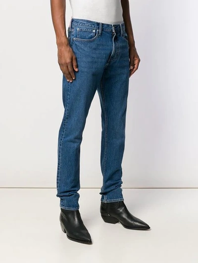 Shop Calvin Klein Jeans Est.1978 Logo Embroidered Bootcut Jeans In Blue
