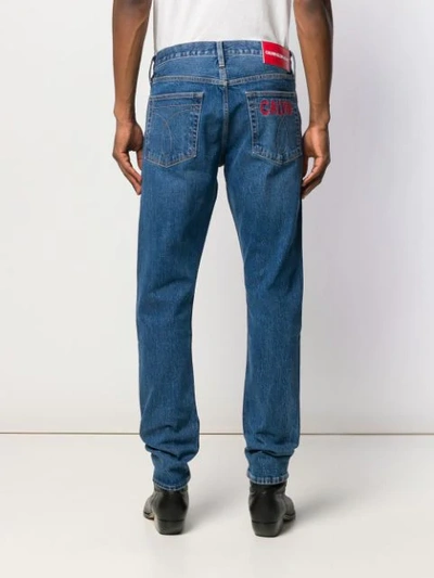 Shop Calvin Klein Jeans Est.1978 Logo Embroidered Bootcut Jeans In Blue