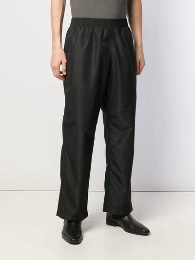 Shop Our Legacy Flared Trousers In Black