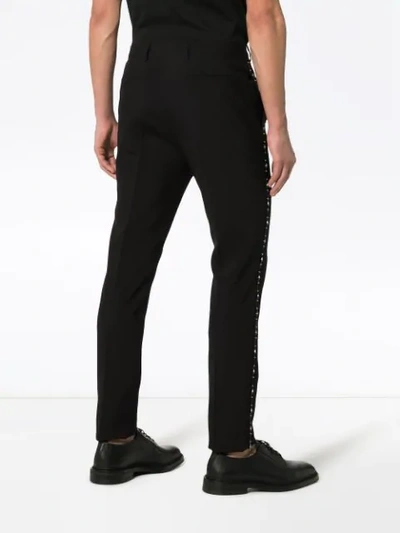 Shop Saint Laurent Stud Embellished Wool Tuxedo Trousers In Black