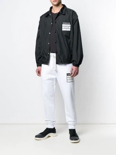 Shop Maison Margiela 'stereotype' Patch Shirt Jacket In Black