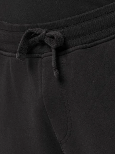 Shop Stone Island Tapered Sweatpants In V0029 Black