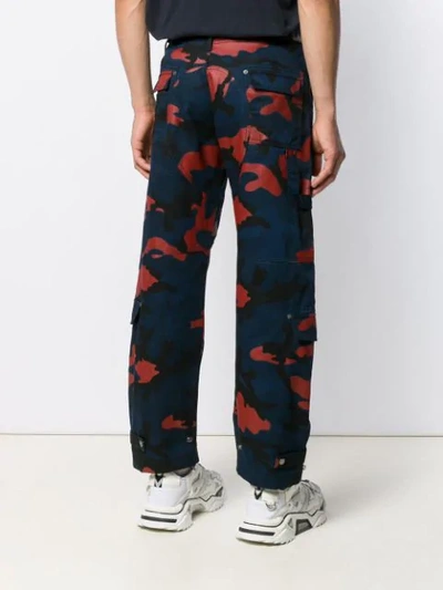 Shop Valentino Camouflage Cargo Trousers In Blue