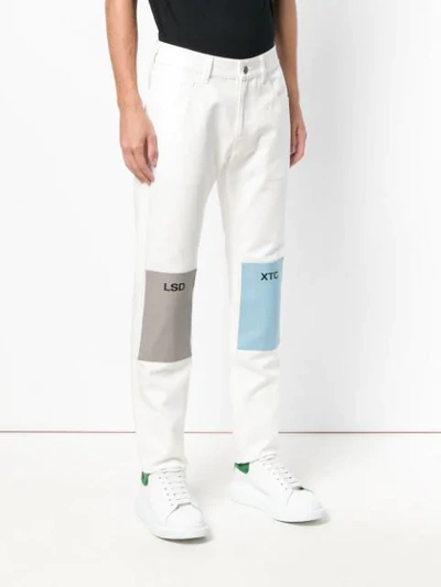 Shop Raf Simons Colour-block Fitted Jeans In White