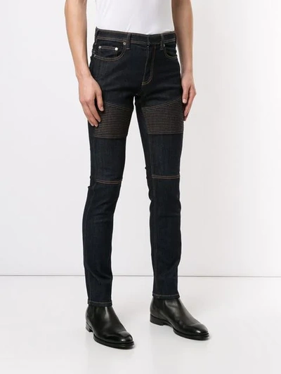 Shop Neil Barrett Lightening Bolt Jeans In Blue