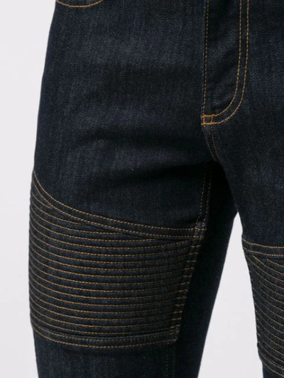 Shop Neil Barrett Lightening Bolt Jeans In Blue