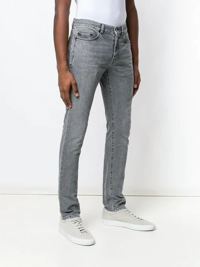 Shop Saint Laurent Classic Skinny Jeans In Grey
