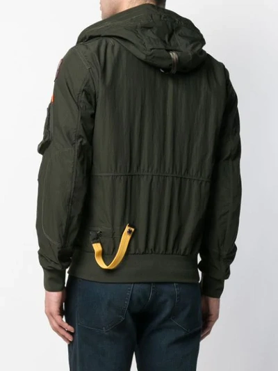 Shop Parajumpers Hooded Raincoat In Green