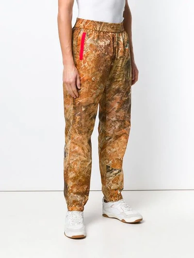 Shop Heron Preston Camouflage Print Track Trousers In Orange
