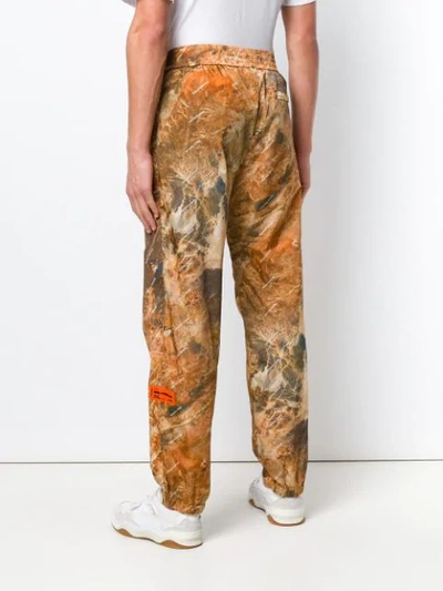 Shop Heron Preston Camouflage Print Track Trousers In Orange