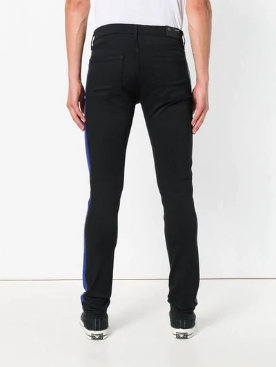 Shop J Brand Mick Skinny Jeans In Black
