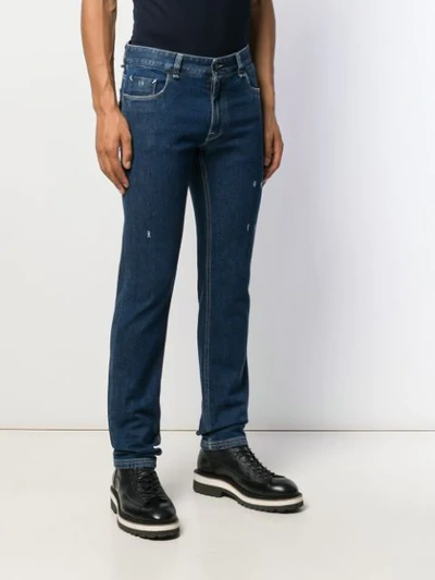 Shop Fendi Diabolic Eyes Slim-fit Jeans In Blue