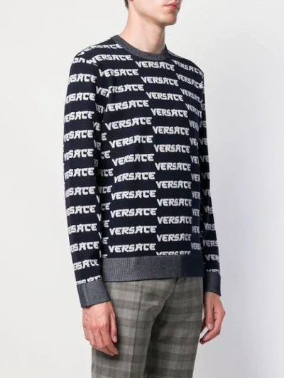 Shop Versace Repeat Logo Knit Jumper In Blue