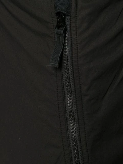 Shop Stone Island Zipped Pocket Trousers In Black