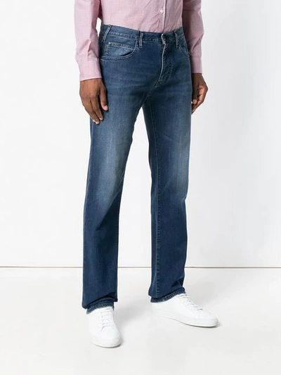 Shop Emporio Armani Light-wash Straight Leg Jeans In Blue