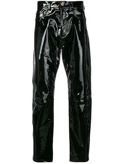 Shop Versace Embellished Leather Trousers In Black