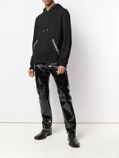 Shop Versace Embellished Leather Trousers In Black