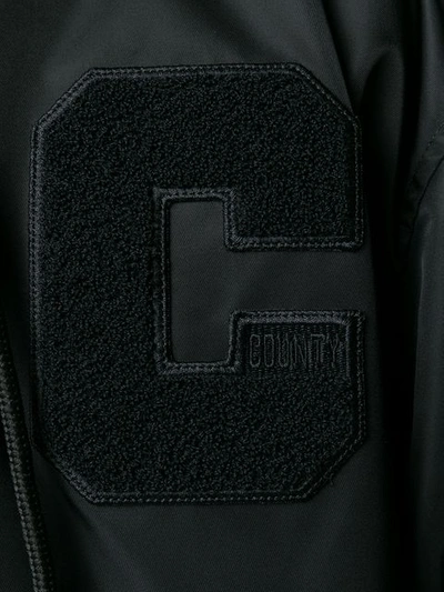 Shop Marcelo Burlon County Of Milan Hooded Bomber Jacket In Black