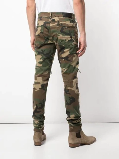 Shop Amiri Patched Slim Jeans In Multicolour