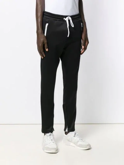 Shop Diesel Logo Appliqué Track Pants In Black